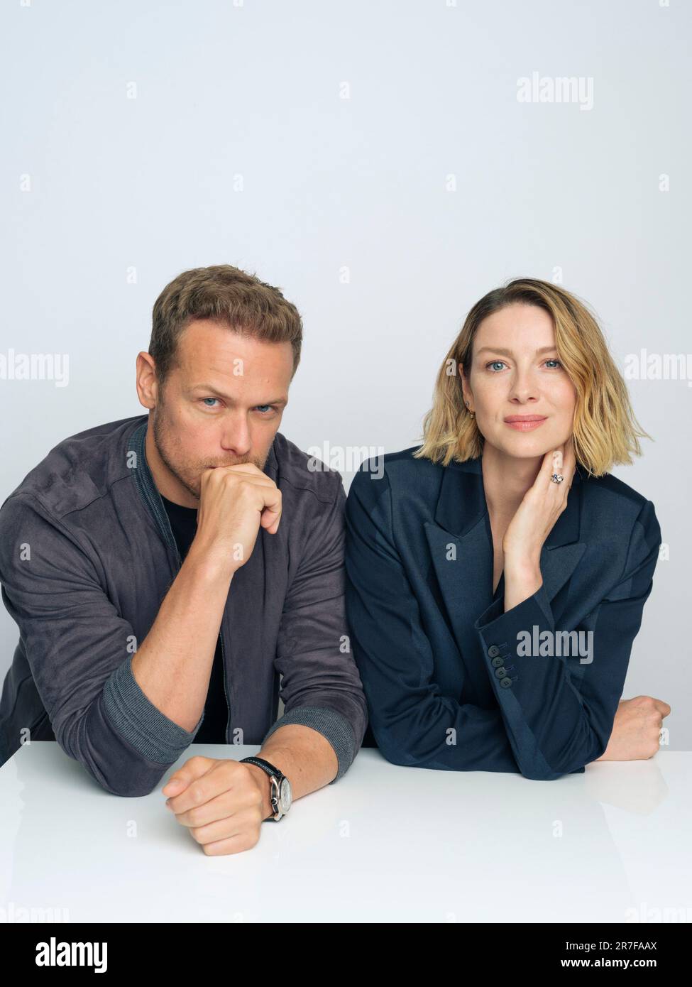 Sam Heughan, left, and Caitriona Balfe pose for a portrait to promote