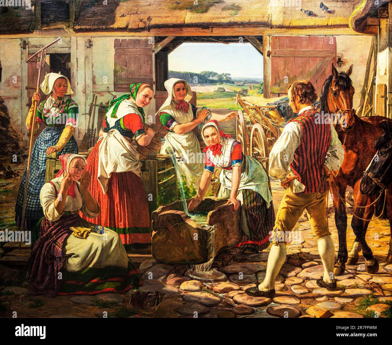 Zealand harvest girls at a well by Jorgen Roed Stock Photo