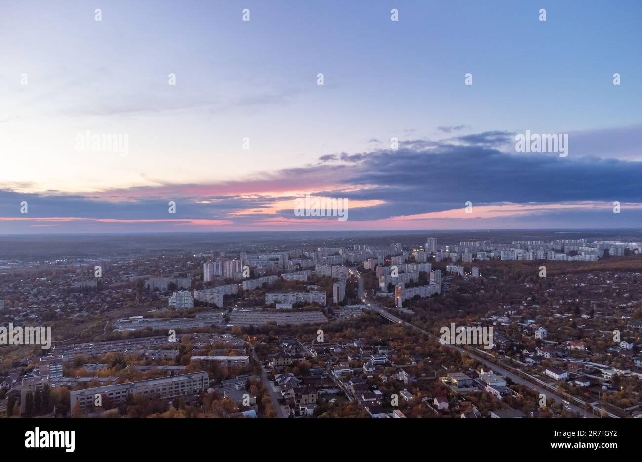 Aerial autumn purple sunset evening city view. Residential district with scenic cloudy sky. Kharkiv, Ukraine Stock Photo