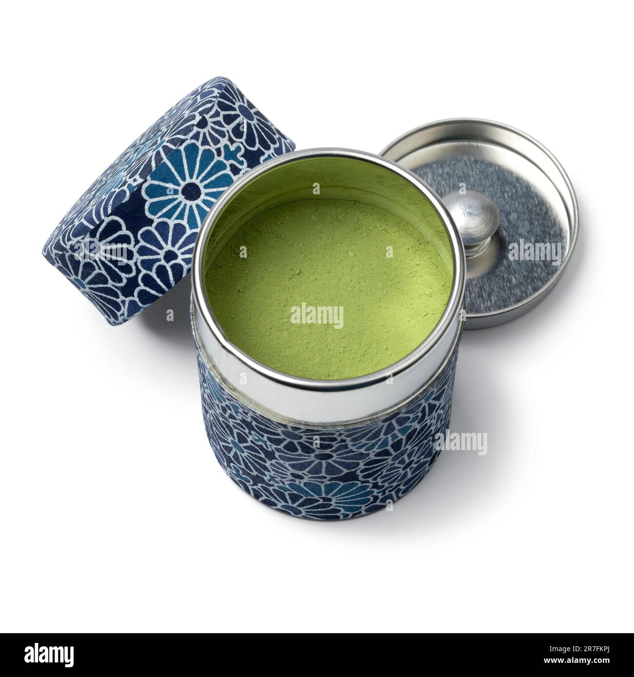 Traditional Japanese tea caddy with matcha tea close up isolated on