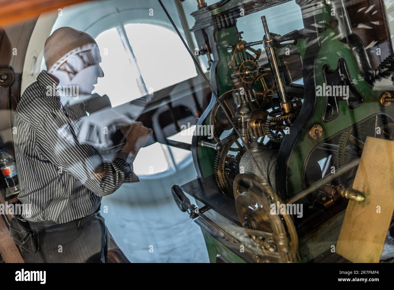 Andre Viger Andre Viger winds up the mechanism of the Parliament tower clock in ...