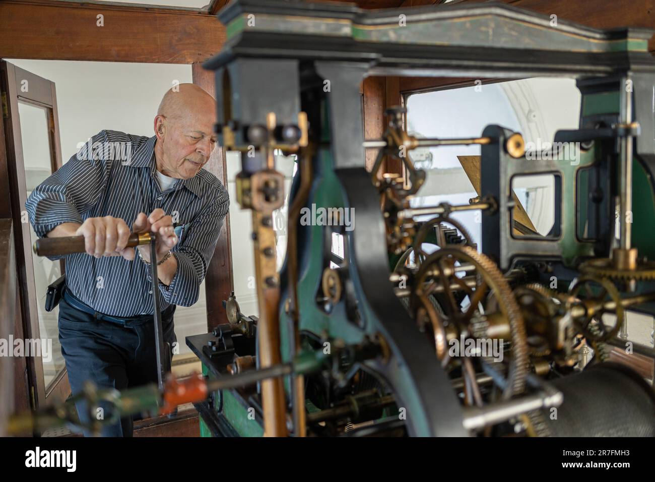 Andre Viger Andre Viger winds up the mechanism of the Parliament tower clock in ...