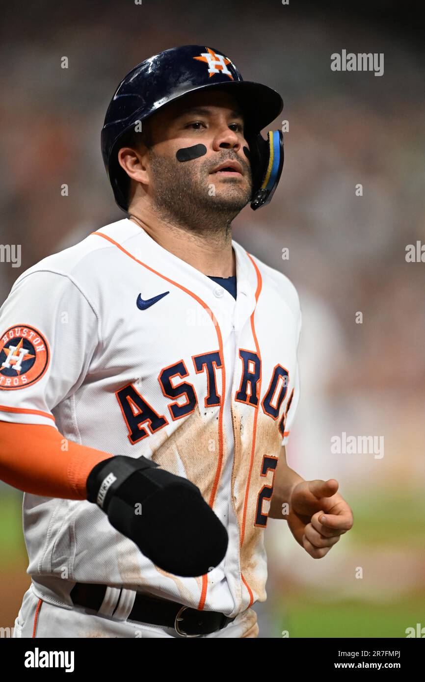 Houston, United States. 16th June, 2023. Houston Astros second baseman Jose  Altuve (27) turns a double play while Cincinnati Reds right fielder Will  Benson (30) slides into second during the MLB interleague