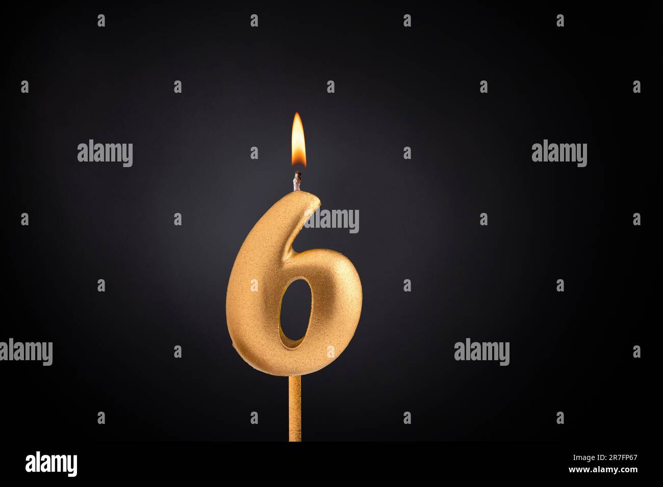 Birthday candle number 6 Birthday celebration on black background