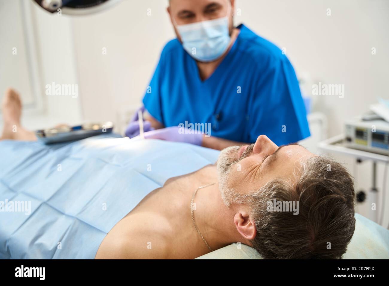Patient given an injection hi-res stock photography and images - Alamy