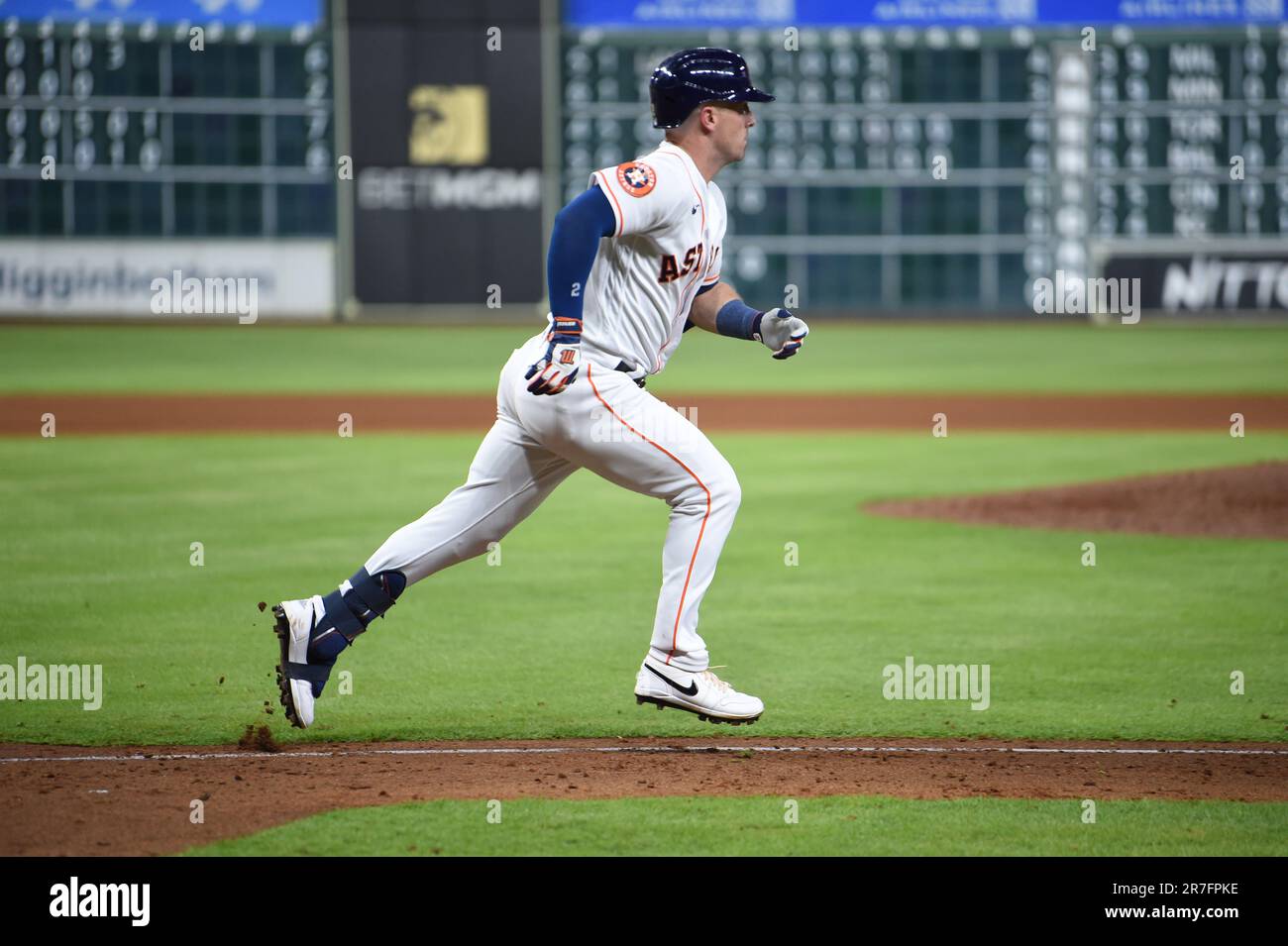 Houston Astros third baseman Alex Bregman (2) runs to first after hitting a single to right in the bottom of the seventh inning during the MLB game be Stock Photo