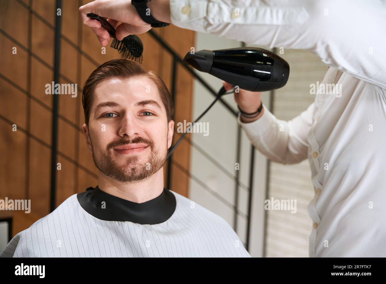 Barbershop haircut process barber trimming hi-res stock photography and ...
