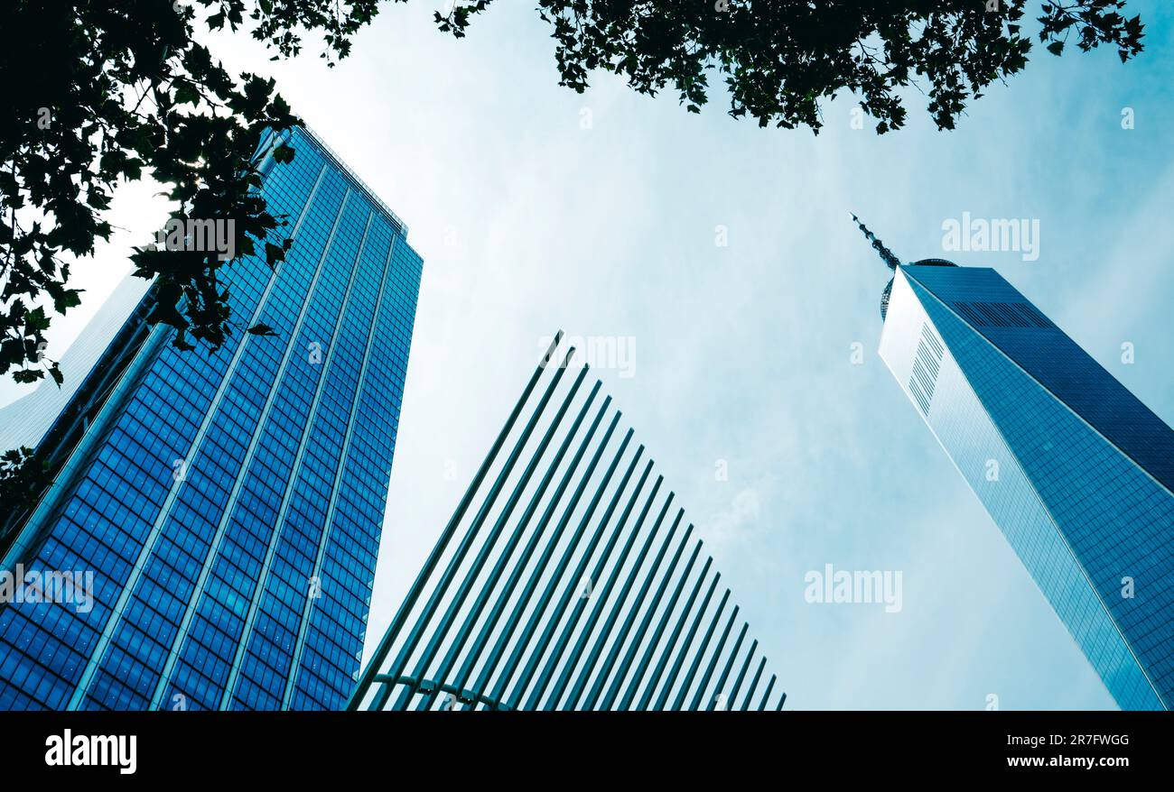 New York City, United States - May 19, 2023: The One World Trade Center building, on the right, and a detail of the Oculus building, on the center, in Stock Photo