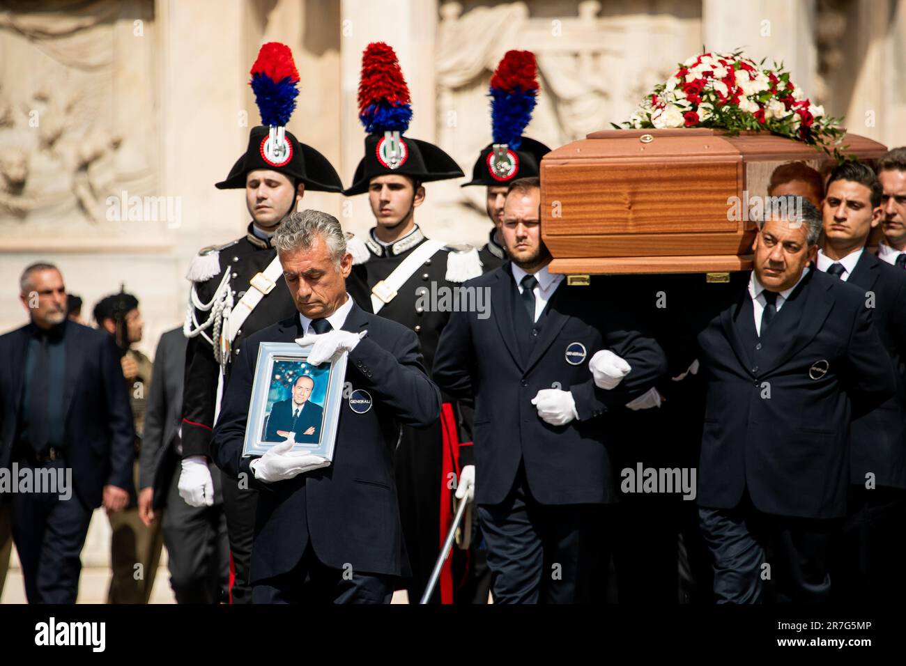 Milano, Italy. 14th June, 2023. Silvio Berlusconi's coffin seen being brought out of the Milan Cathedral during the funeral ceremony. On 12 June 2023, former Prime Minister of Italy Silvio Berlusconi died at the San Raffaele Hospital in Milan, at the age of 86, due to complications from a severe form of chronic myelomonocytic leukemia. Credit: SOPA Images Limited/Alamy Live News Stock Photo