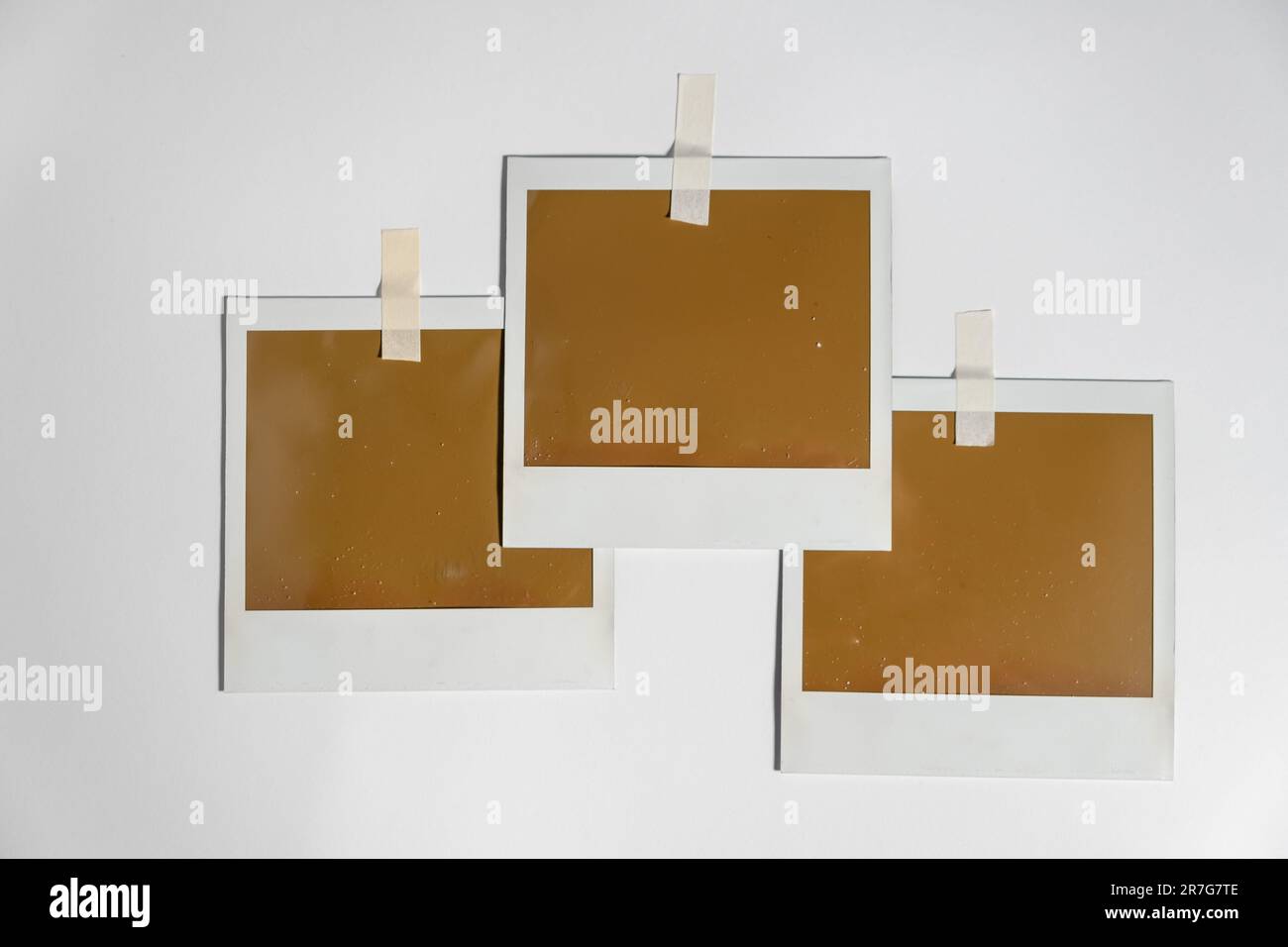 Three blank photo frames on white background. Stock Photo