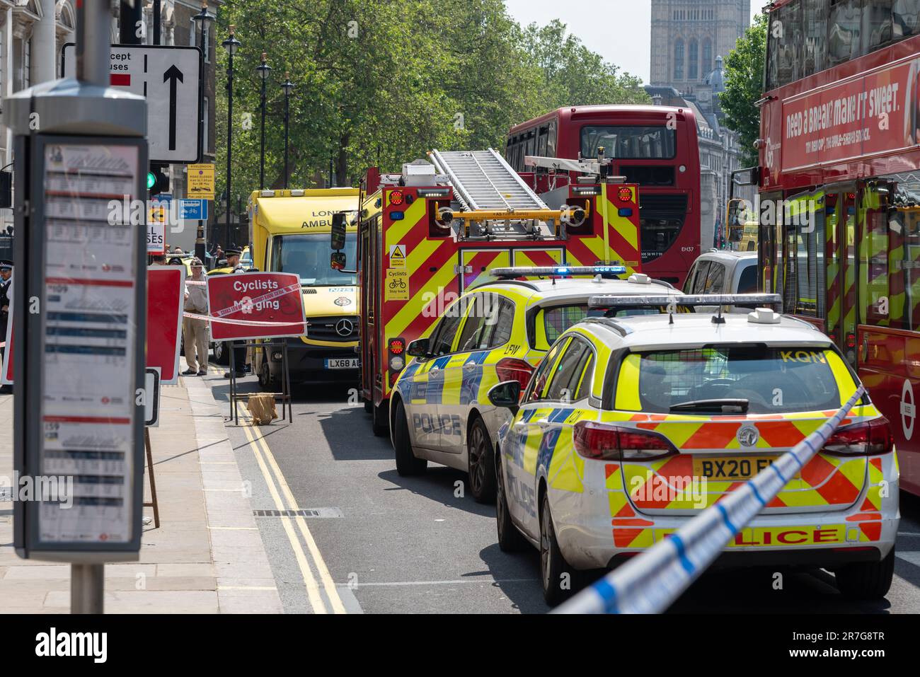 Emergency services on scene of an incident in Whitehall, Westminster, London, UK. Police, ambulance, fire brigade all attending. Taped off Stock Photo