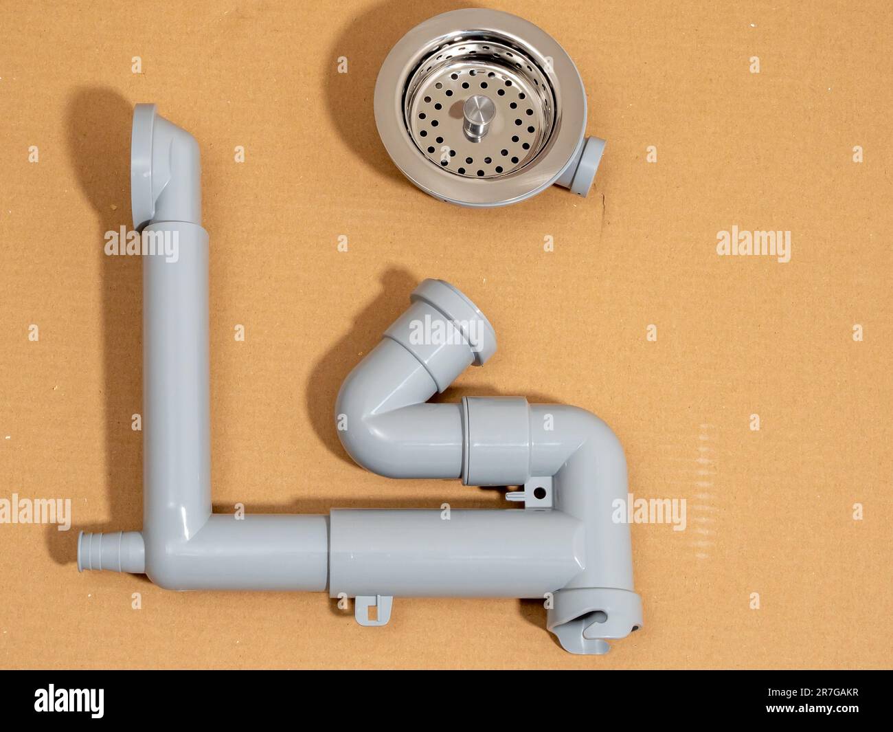 Connections for installing a kitchen sink. kitchen siphon. Stock Photo