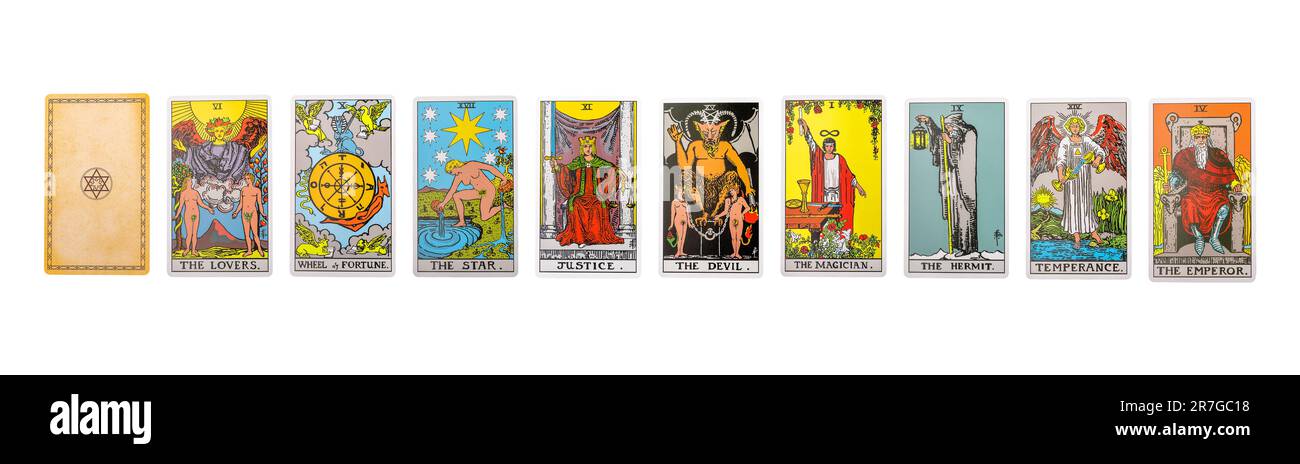 Lodz Poland June 11 2023 Tarot cards set, major arcanas of Lovers, Star, Hermit, Emperor and Devil isolated on white background. Stock Photo