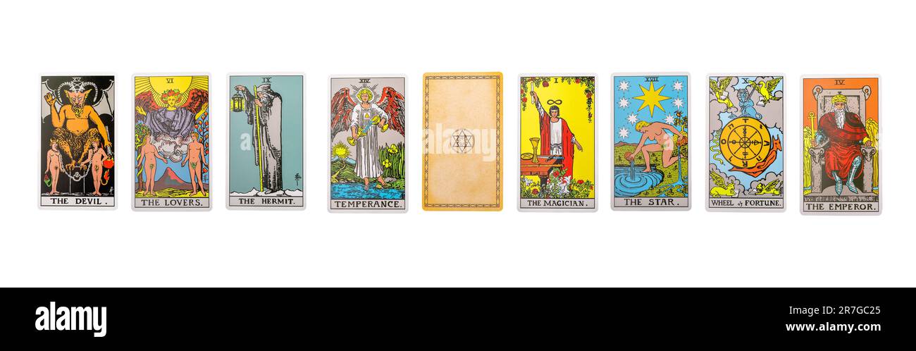 Lodz Poland June 11 2023 Tarot cards set, major arcanas of Lovers, Star, Magician and Devil isolated on white background. Stock Photo