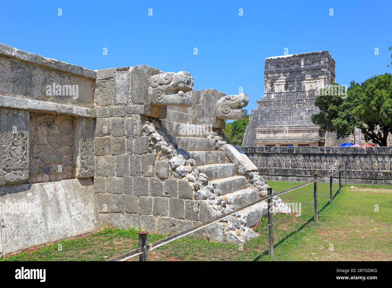 The Platform of the Eagles and Jaguars and The Temple of the Jaguar at Chichen Itza, Yucatan, Yucatan Peninsular, Mexico. Stock Photo