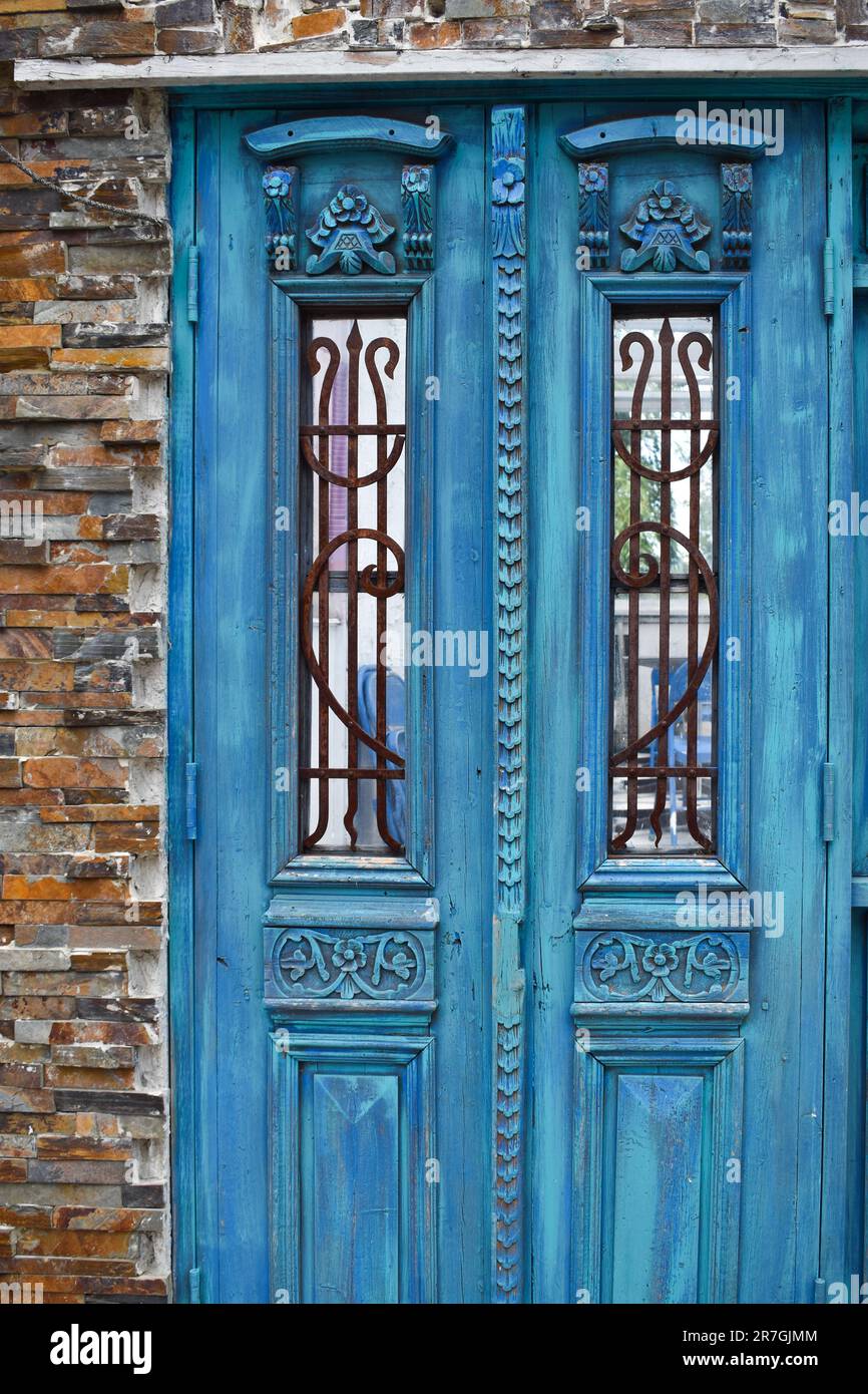 Bright blue Greek style door architecture Stock Photo