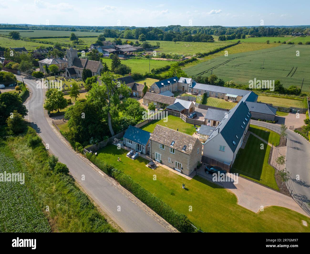 15th June 2023 Barn conversions and a new housing development in a small village in Lincolnshire Stock Photo