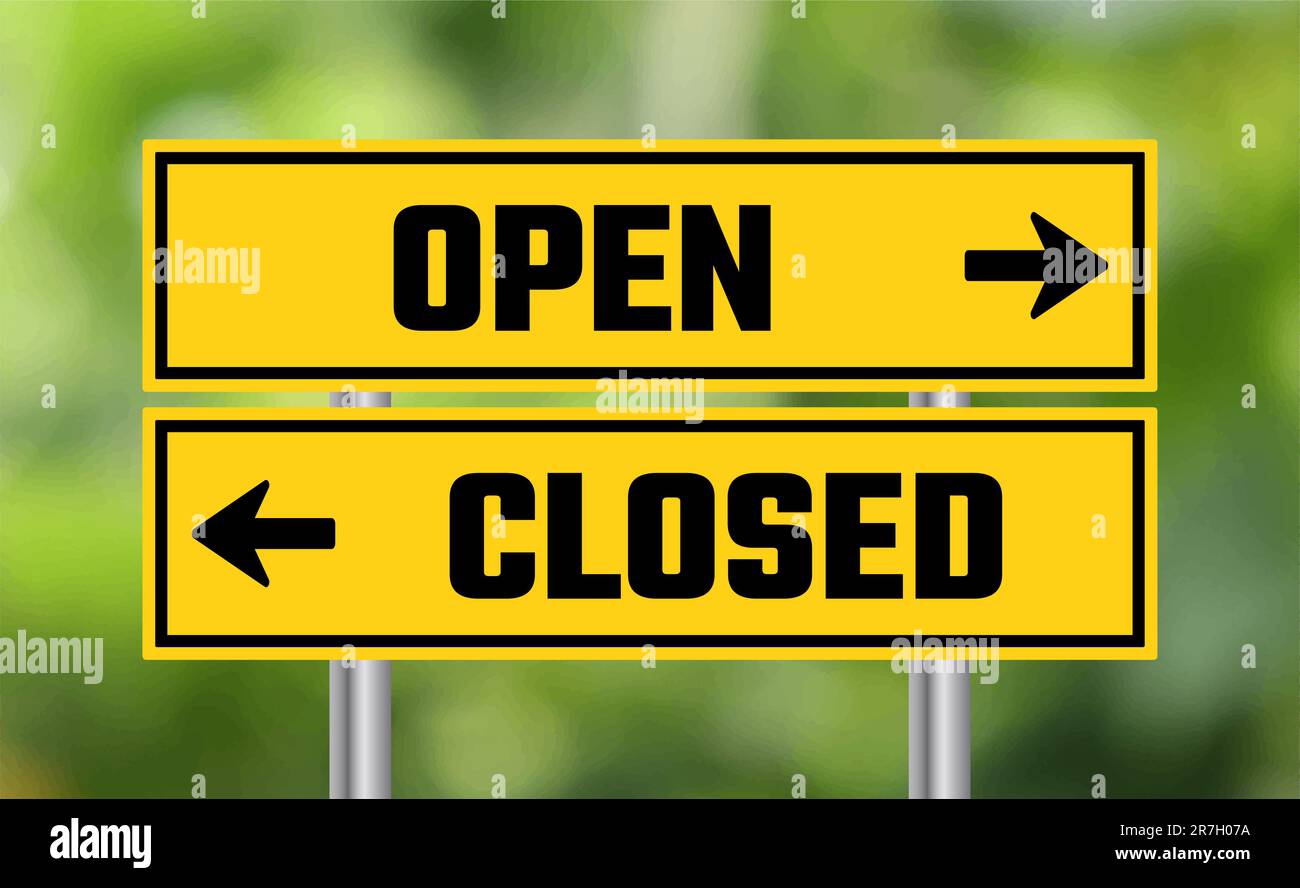 Open or closed road sign on blur background Stock Photo - Alamy