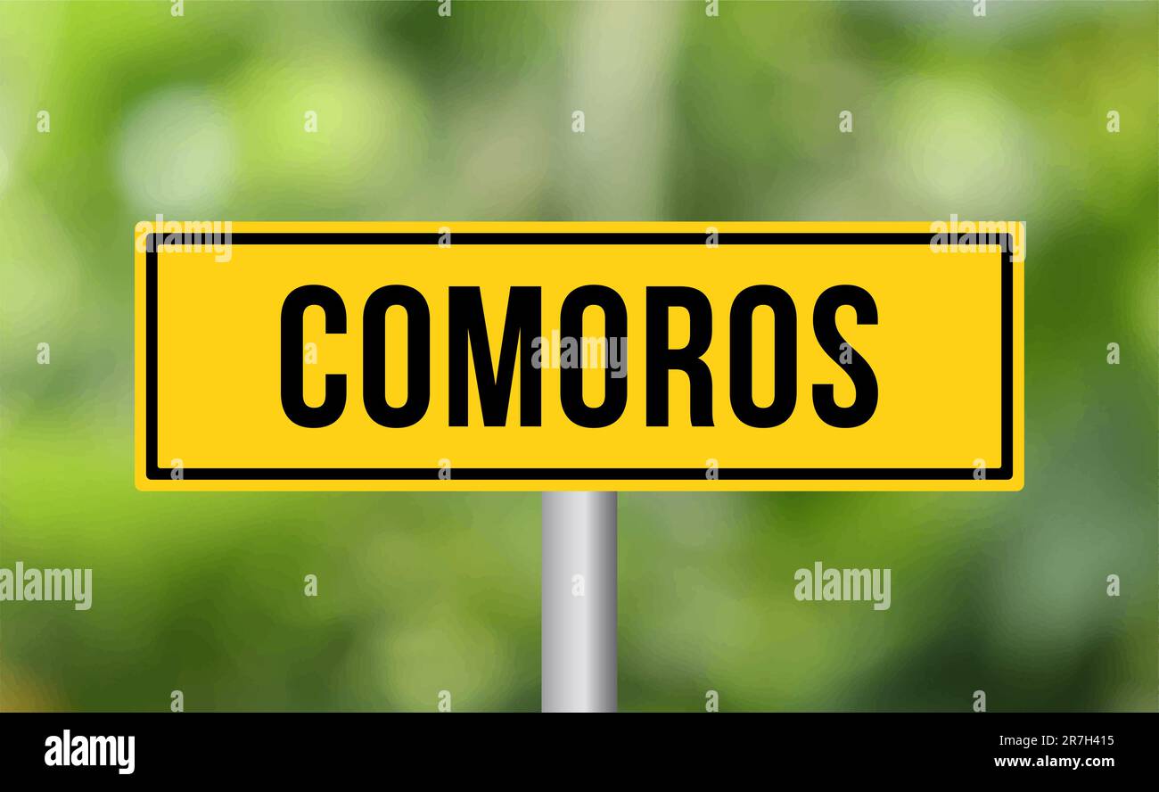 Comoros road sign on blur background Stock Photo - Alamy