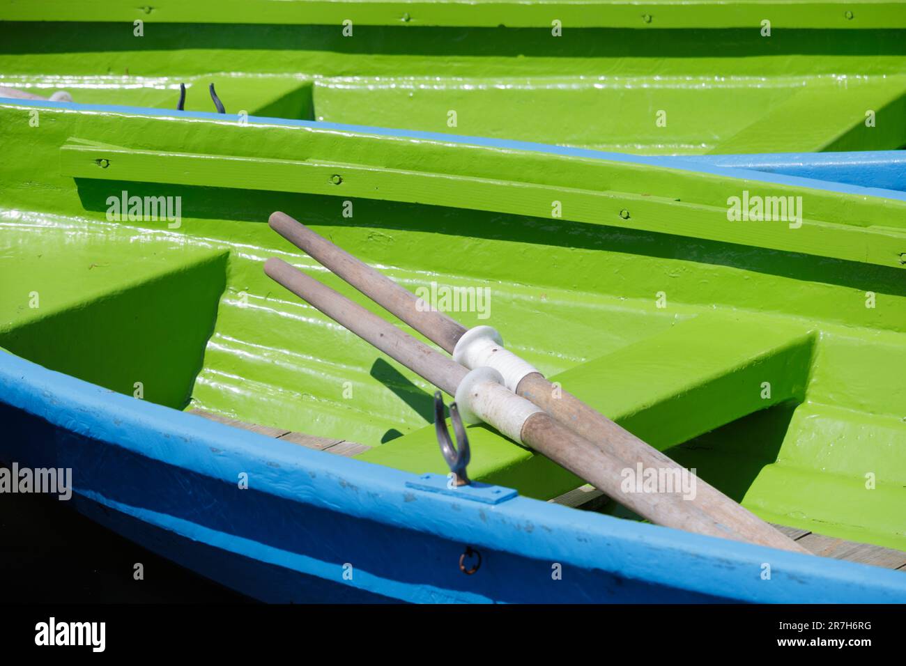 Pair of oars in a wooden rowing boat Stock Photo