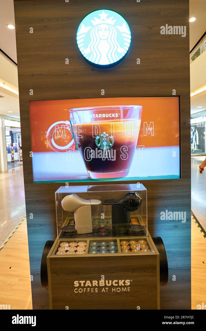 KUALA LUMPUR, MALAYSIA - CIRCA MARCH, 2023: the Starbucks Siren sign seen at Starbucks Coffee in Kuala Lumpur Stock Photo