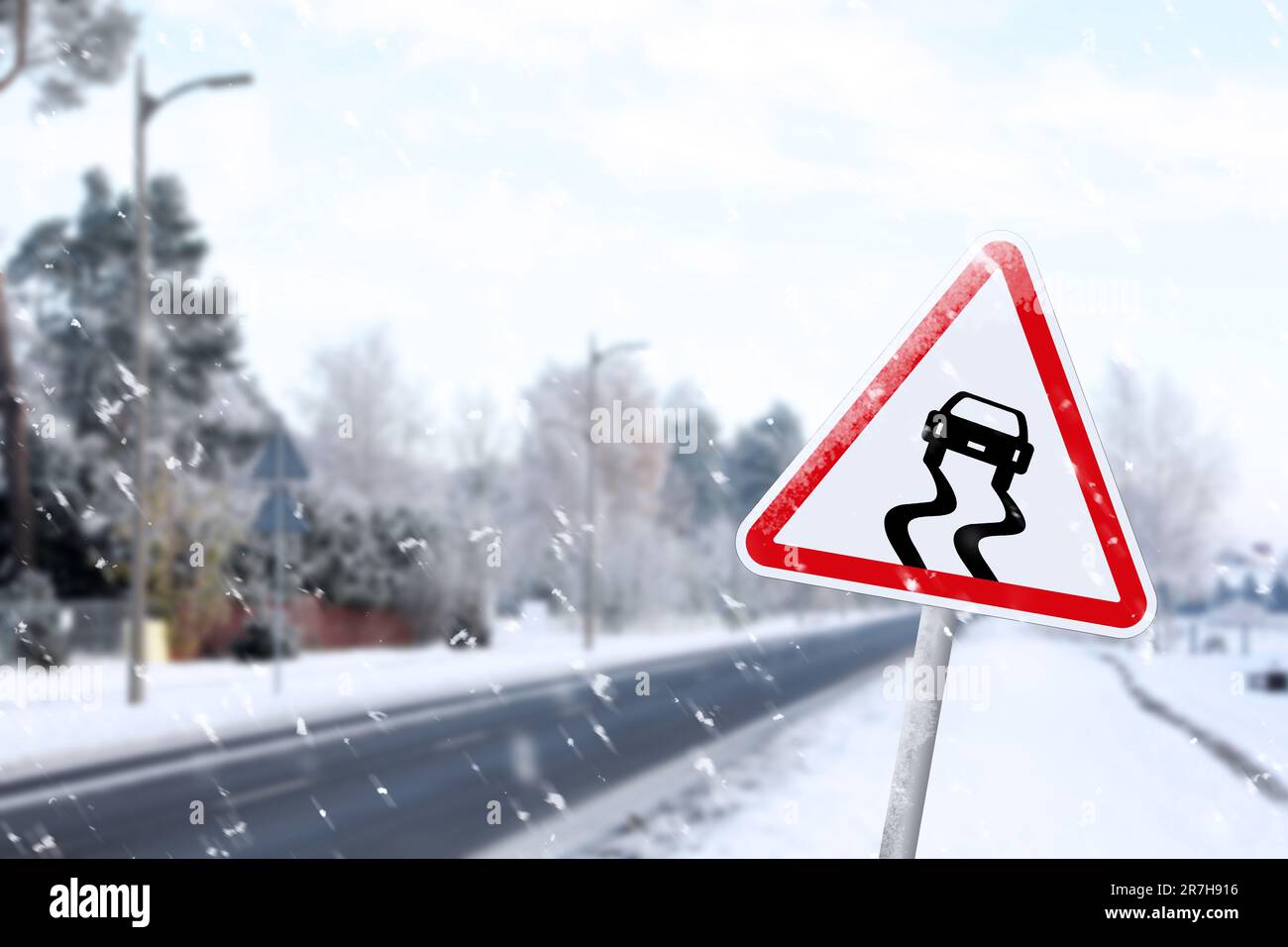 Snowyproof Sign Highway with Slippery Surface road sign on snowy day, space for text ...