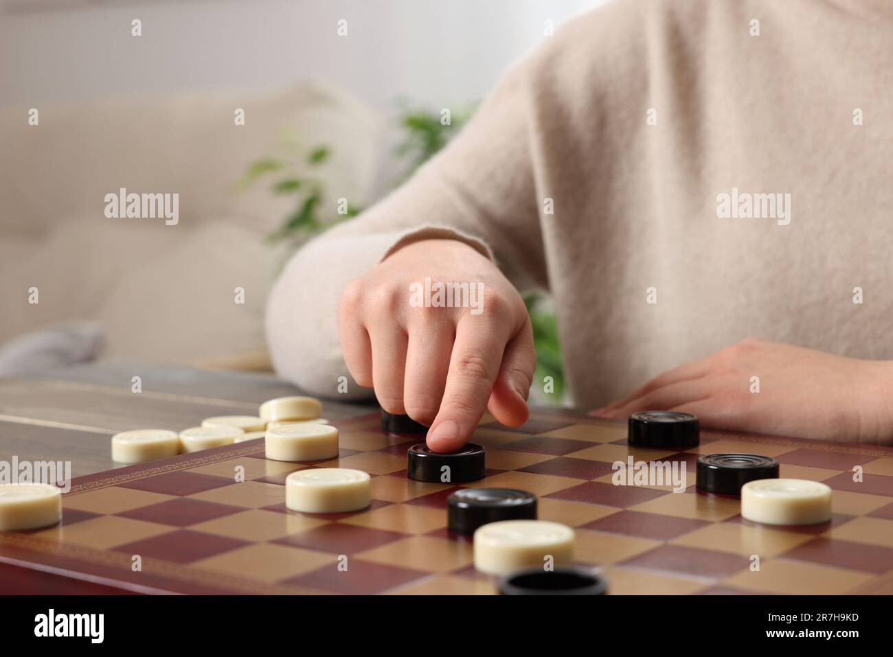 Senior man thinking about his next move in a game of chess Stock Photo by  dmytros9