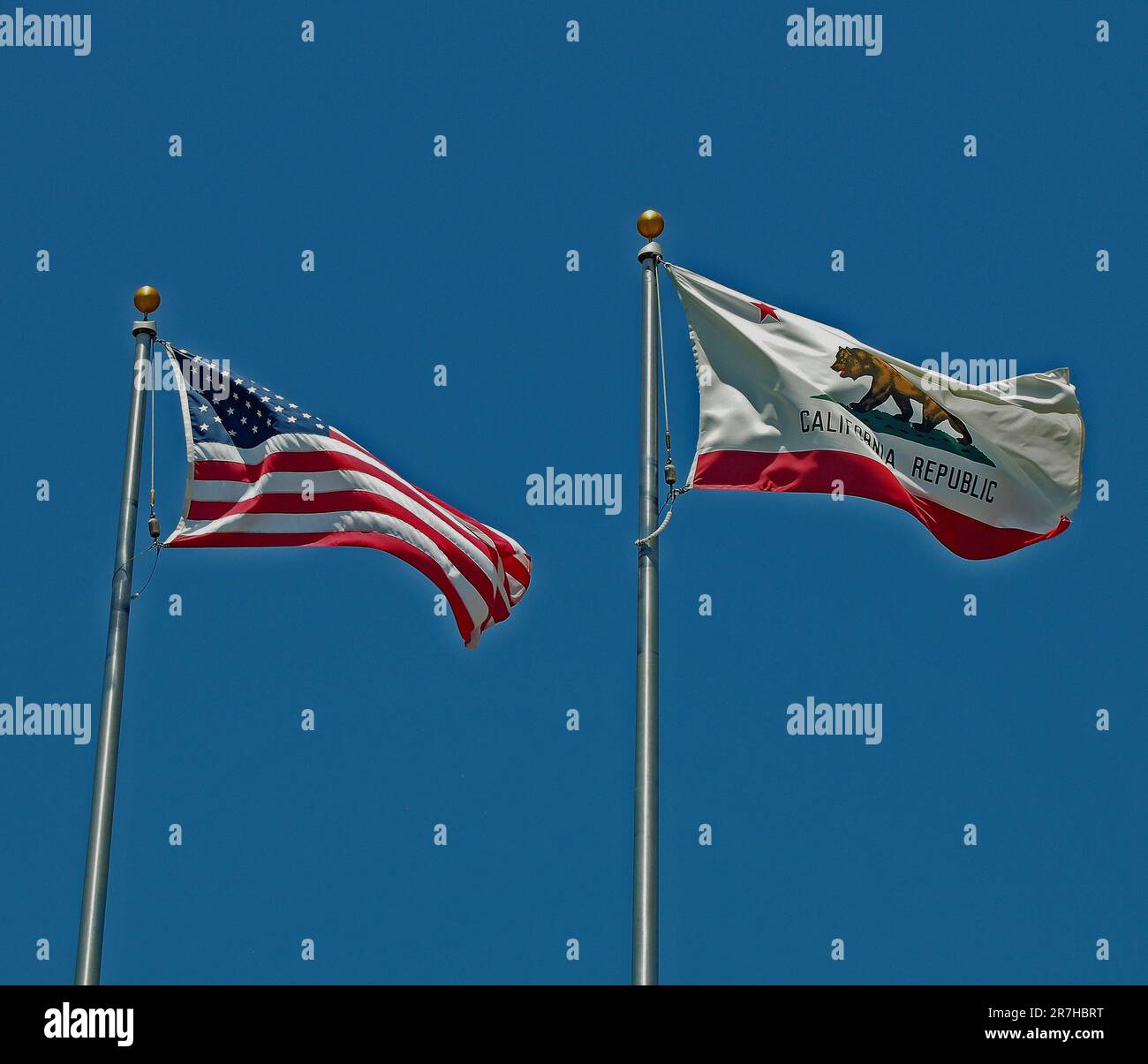American stars and stripes flag and California Republic grizzly Bear state flag in Dublin, California Stock Photo