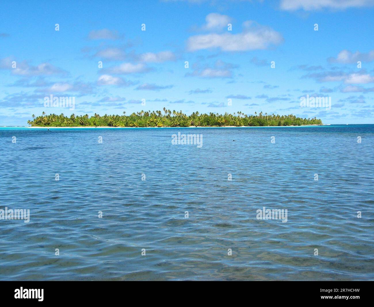 Motu - a small Polynesian island in an atoll / lagoon. Stock Photo