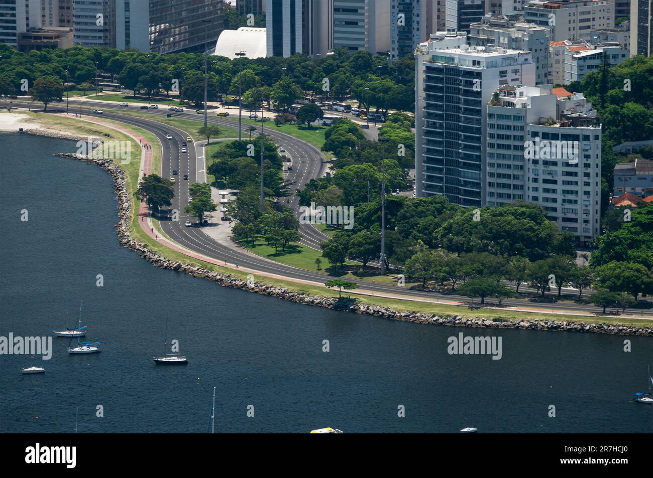 View of Botafogo district coastline with Guanabara bay waters full of  sailboats and vessels anchored nearby the Yatch Club under summer sunny day  Stock Photo - Alamy