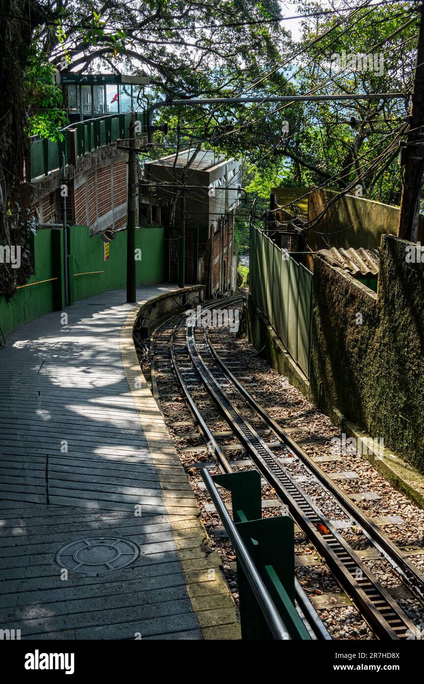 The empty curved platform of Corcovado Rack Railway Cristo Redentor station located on the summit of Corcovado mountain under summer sunny day. Stock Photo