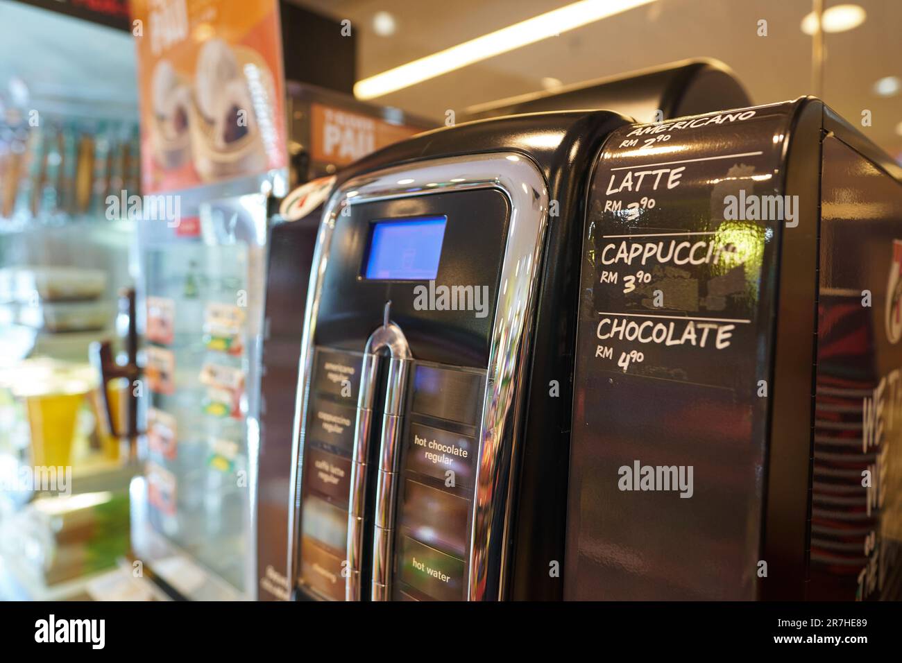 KUALA LUMPUR, MALAYSIA - CIRCA MARCH, 2023: close up shot of coffee machine at 7-Eleven convenience store in Kuala Lumpur. 7-Eleven, Inc. is a multina Stock Photo
