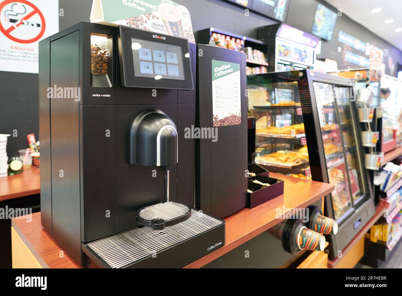 KUALA LUMPUR, MALAYSIA - CIRCA MARCH, 2023: close up shot of Schaerer coffee machine seen at 7-eleven store. Stock Photo