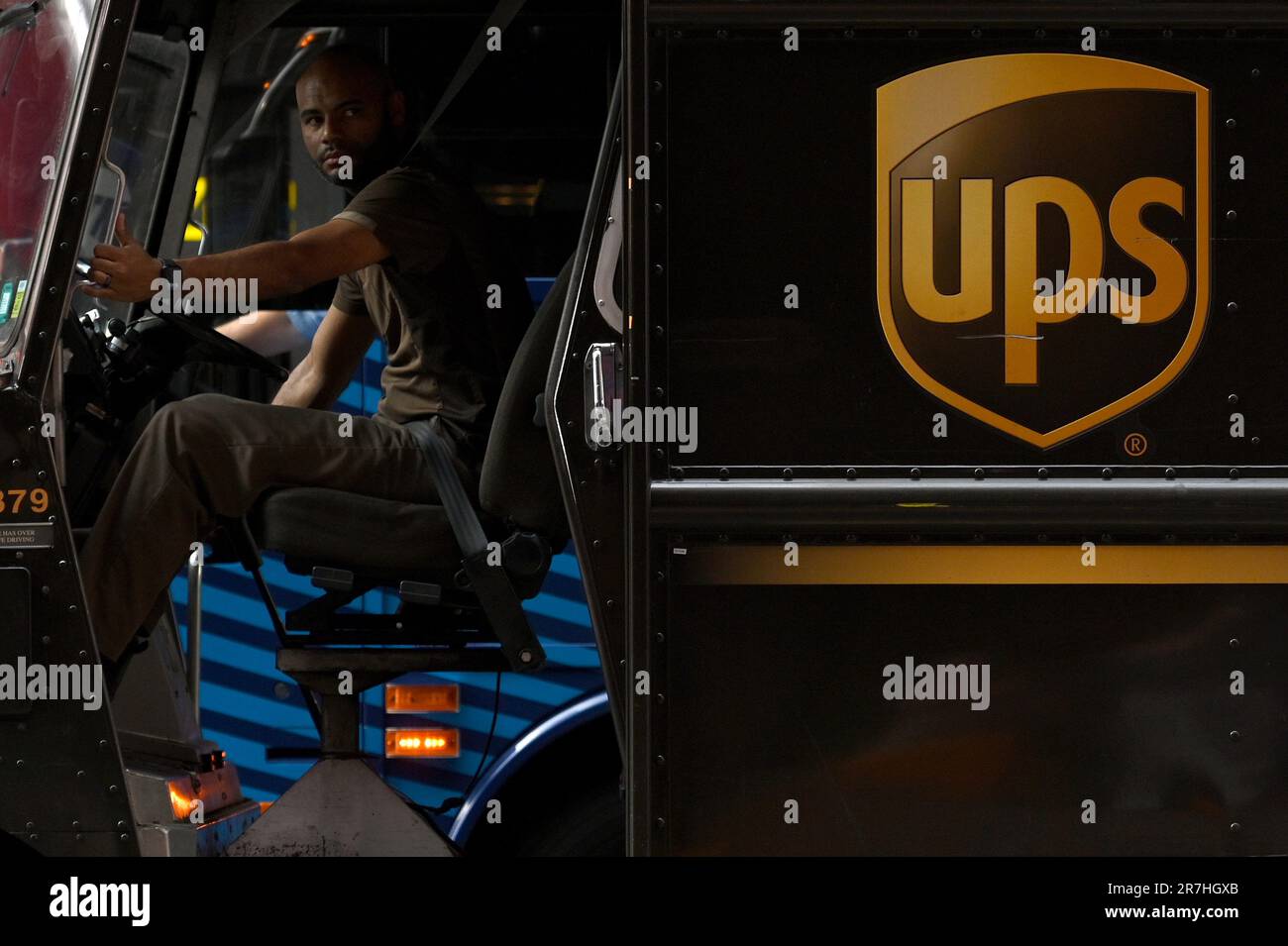 The new york times delivery trucks hires stock photography and images