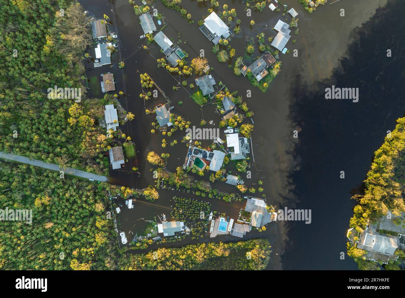 Aftermath of natural disaster. Flooded houses by hurricane Ian rainfall