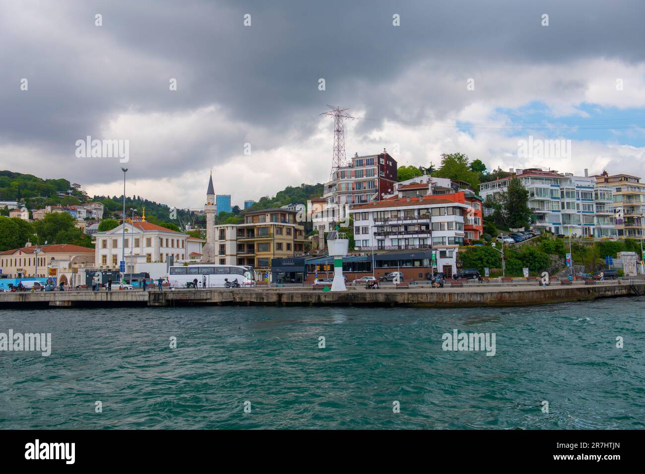 Arnavutkoy village historic waterfront commercial buildings at Bosporus strait waterside at Besiktas district in historic city of Istanbul, Turkey. Stock Photo