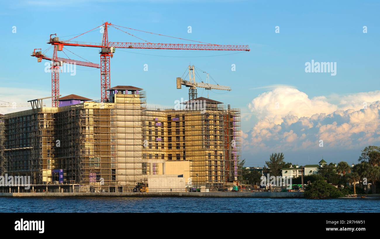 Tower lifting cranes at high residential apartment buildings ...