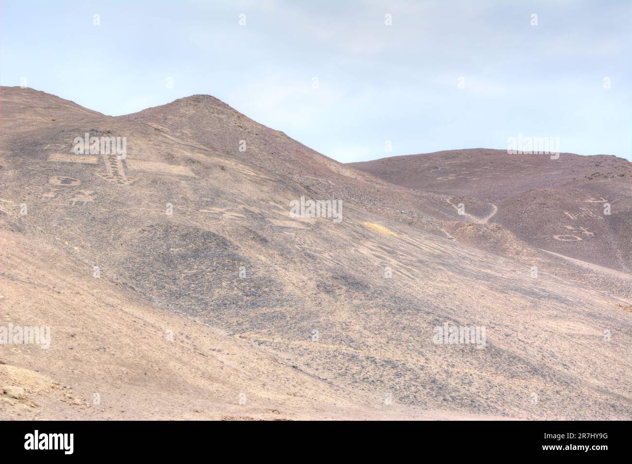 Hills with numerous ancient petroglyphs of the ancient Tiwanaku (Geoglifos de Cerro Pintados) culture in Chile Stock Photo