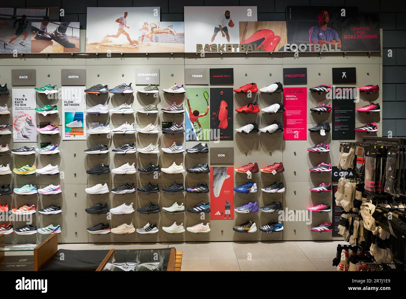 HO CHI MINH CITY, VIETNAM - CIRCA MARCH, 2023: various footwear on display  at Adidas store in Crescent Mall Stock Photo - Alamy