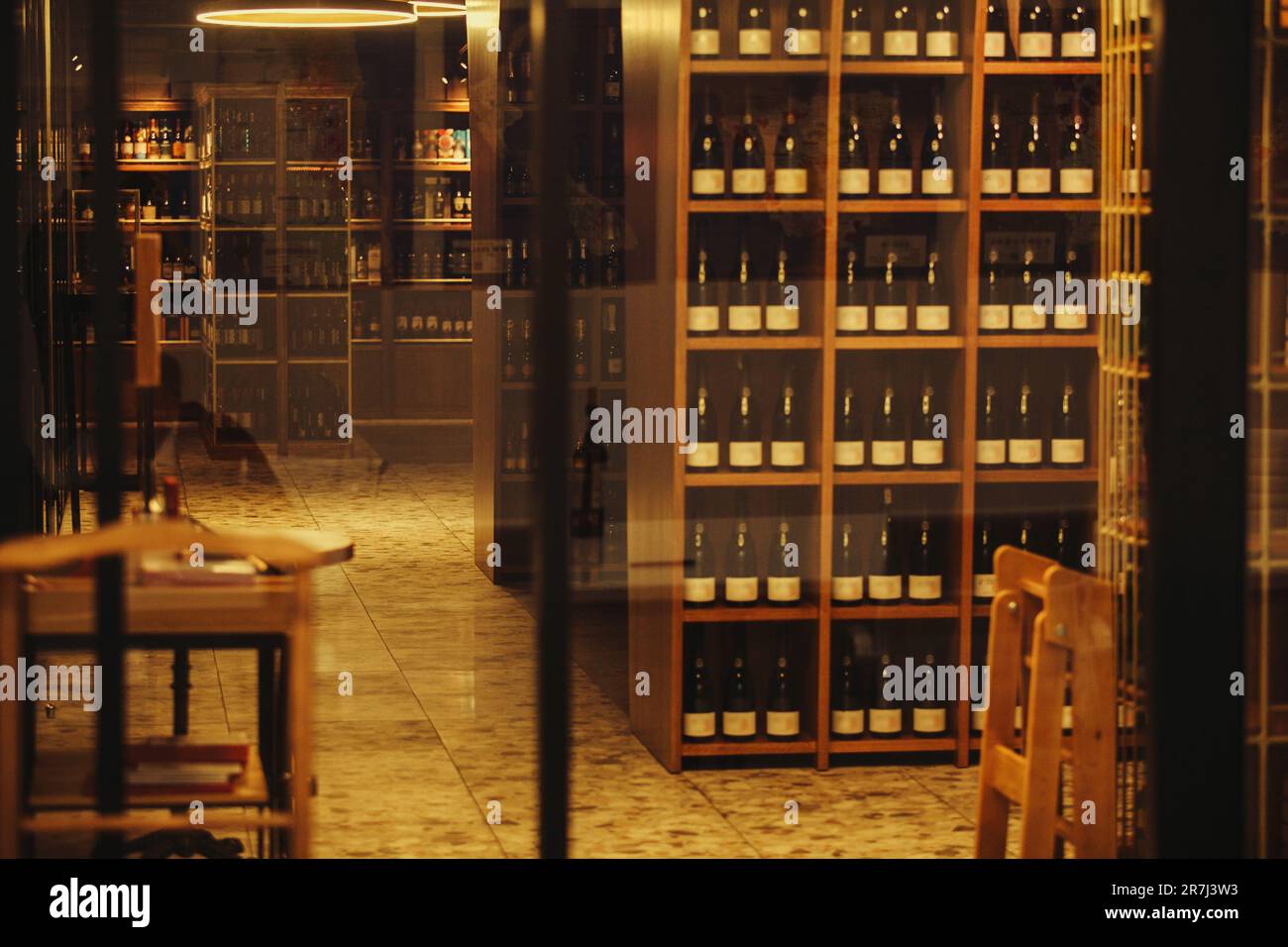 Wine room with many various alcoholic beverage. Cellar for storing