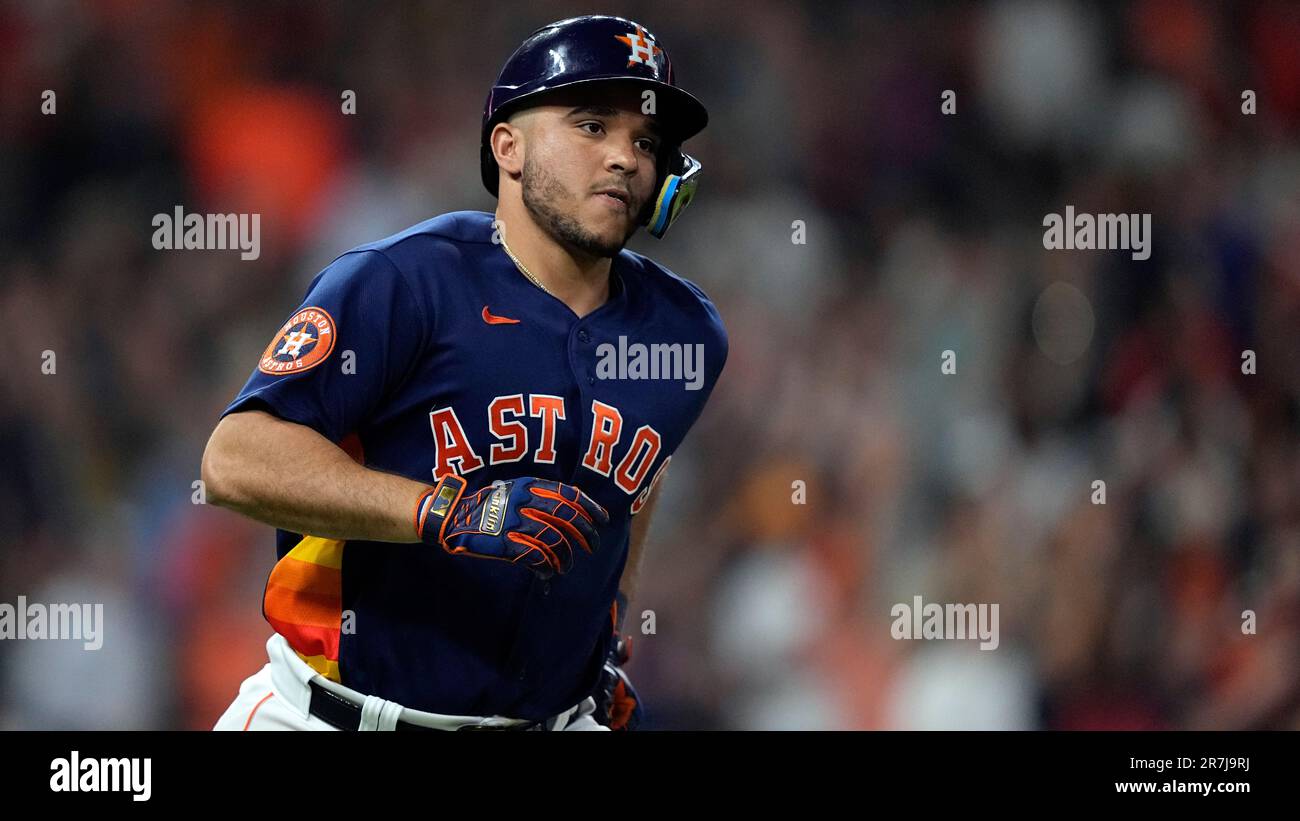 Houston Astros' Yainer Diaz runs up the first base line against