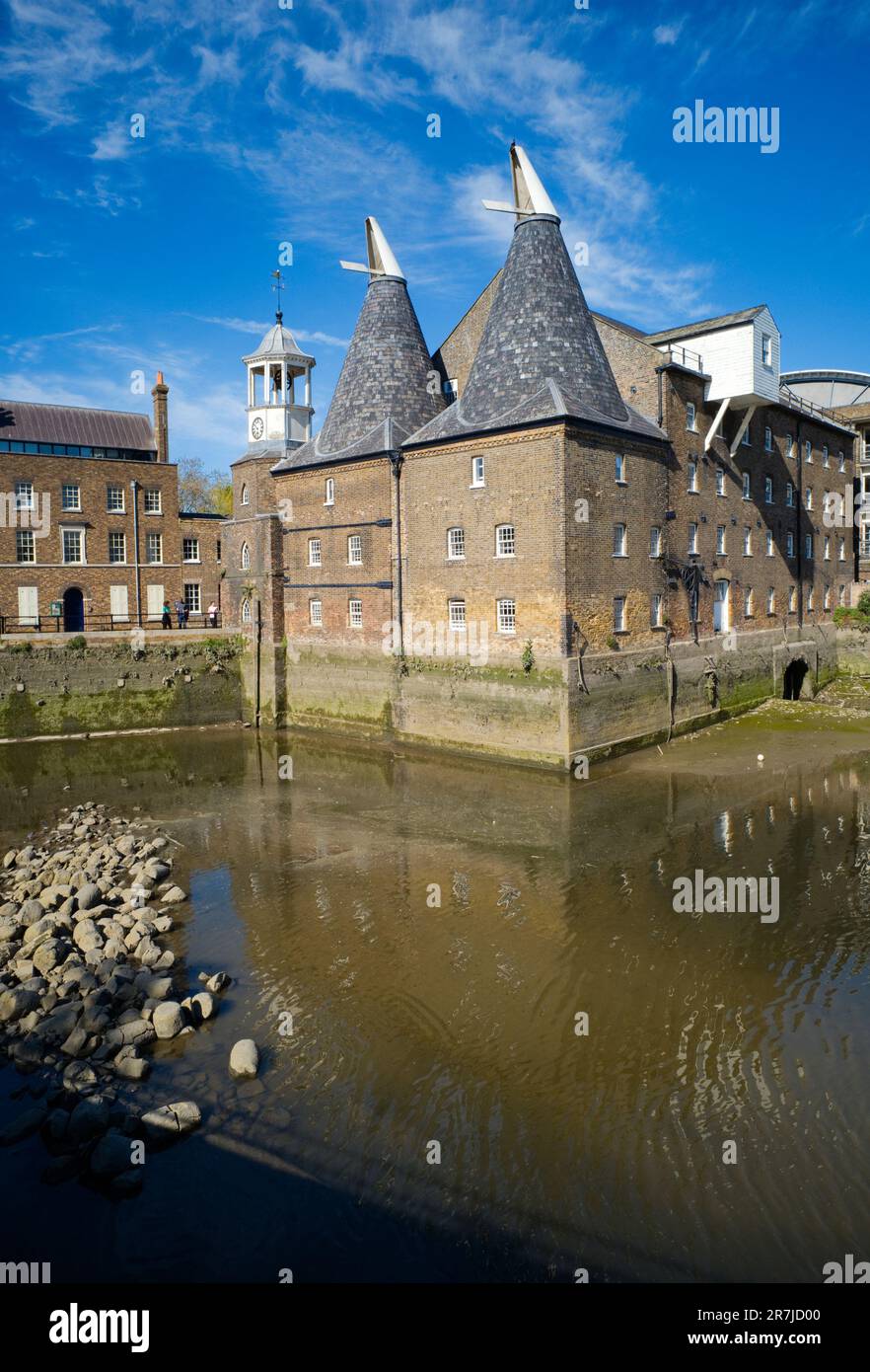 The Clock Mill at Three Mills Island is a tidal mill next to Bow Creek near Stratford in London Stock Photo