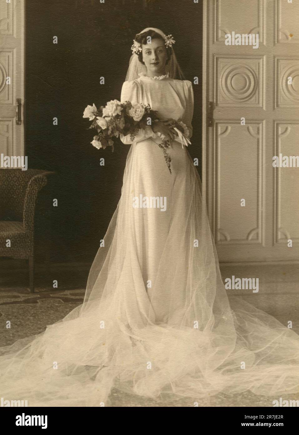 Portrait of a beautiful bride dressed in white, Italy 1930s Stock Photo