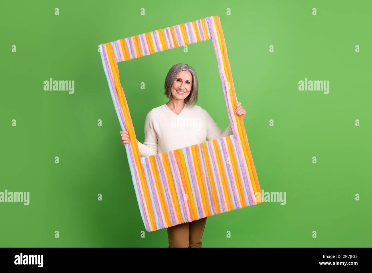Photo of pensioner old grey hair woman hold huge capture borders ...