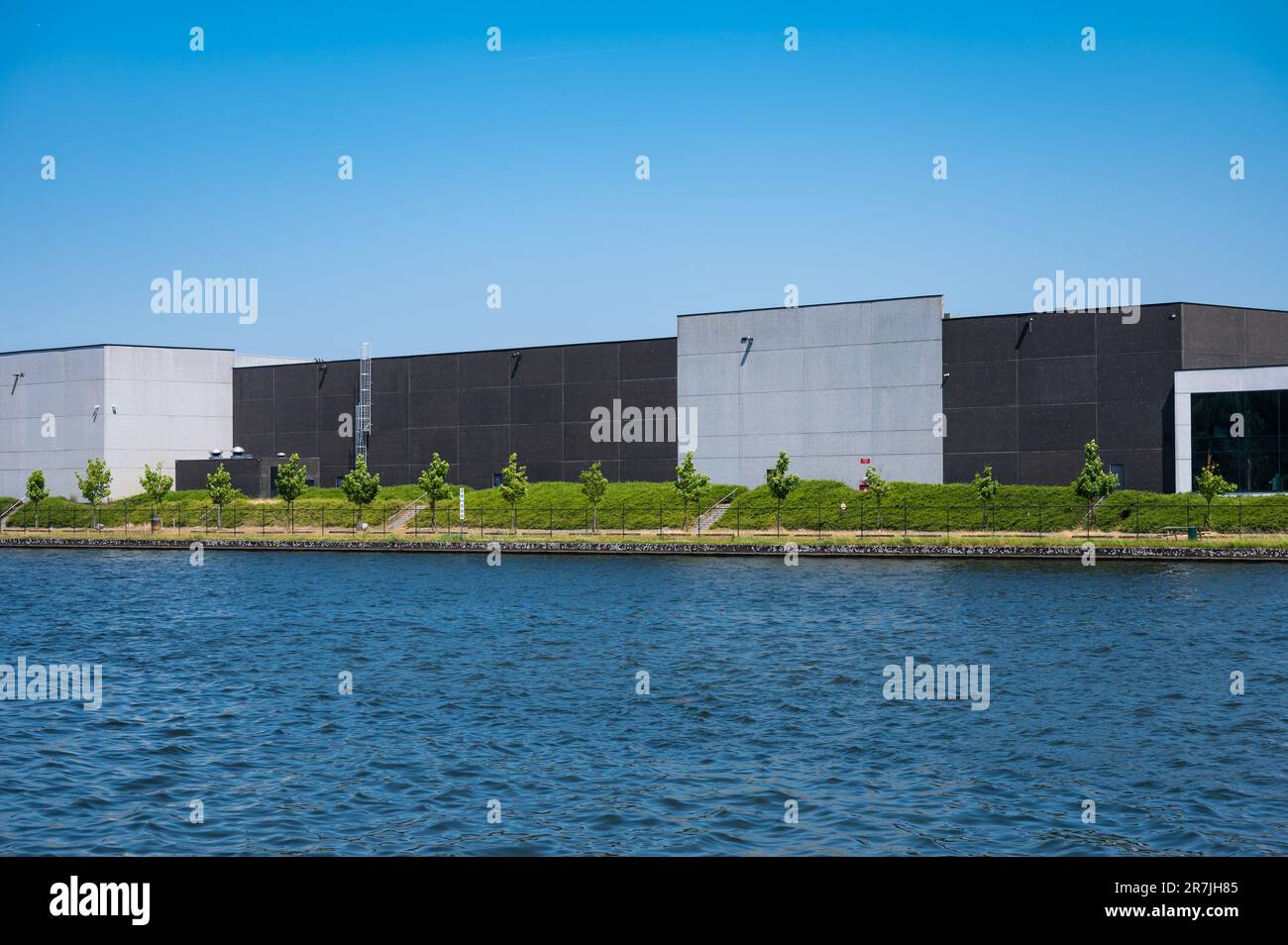 Bornem, Antwerp Province, Belgium, June 11, 2023 - Industrial construction activity at the banks of the river Scheldt Stock Photo