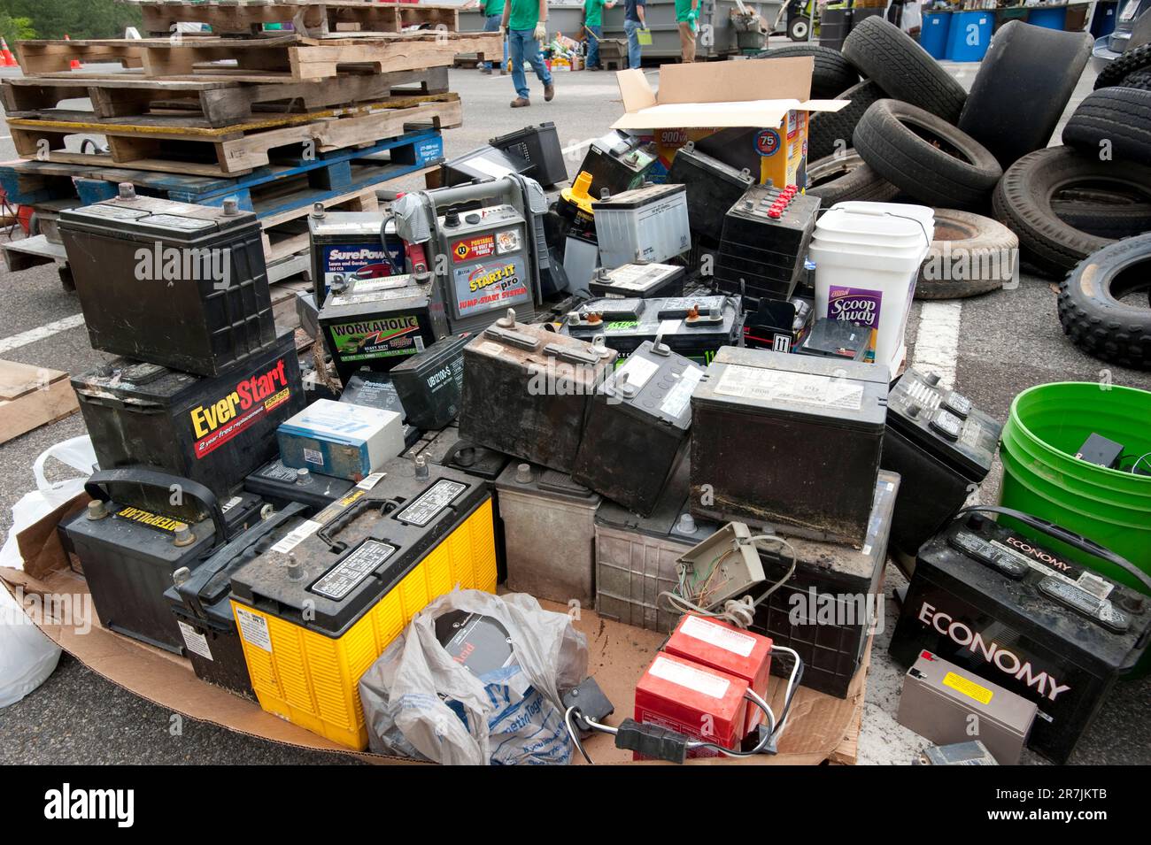 Car batteries and tires dropped off for recycling day Stock Photo Alamy