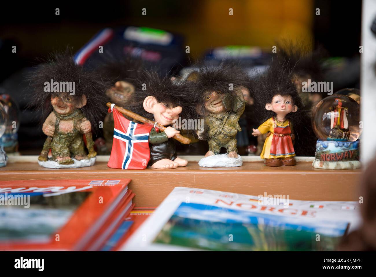 Toy trolls for sales to tourists who visit Norway. A troll is a member of a race of fearsome creatures from Norse mythology. Stock Photo