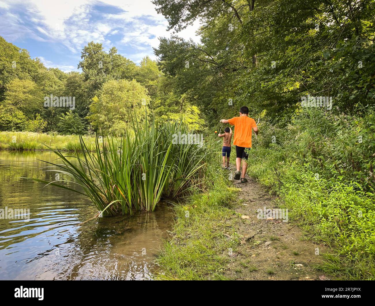Two boys fishing lake hi-res stock photography and images - Alamy