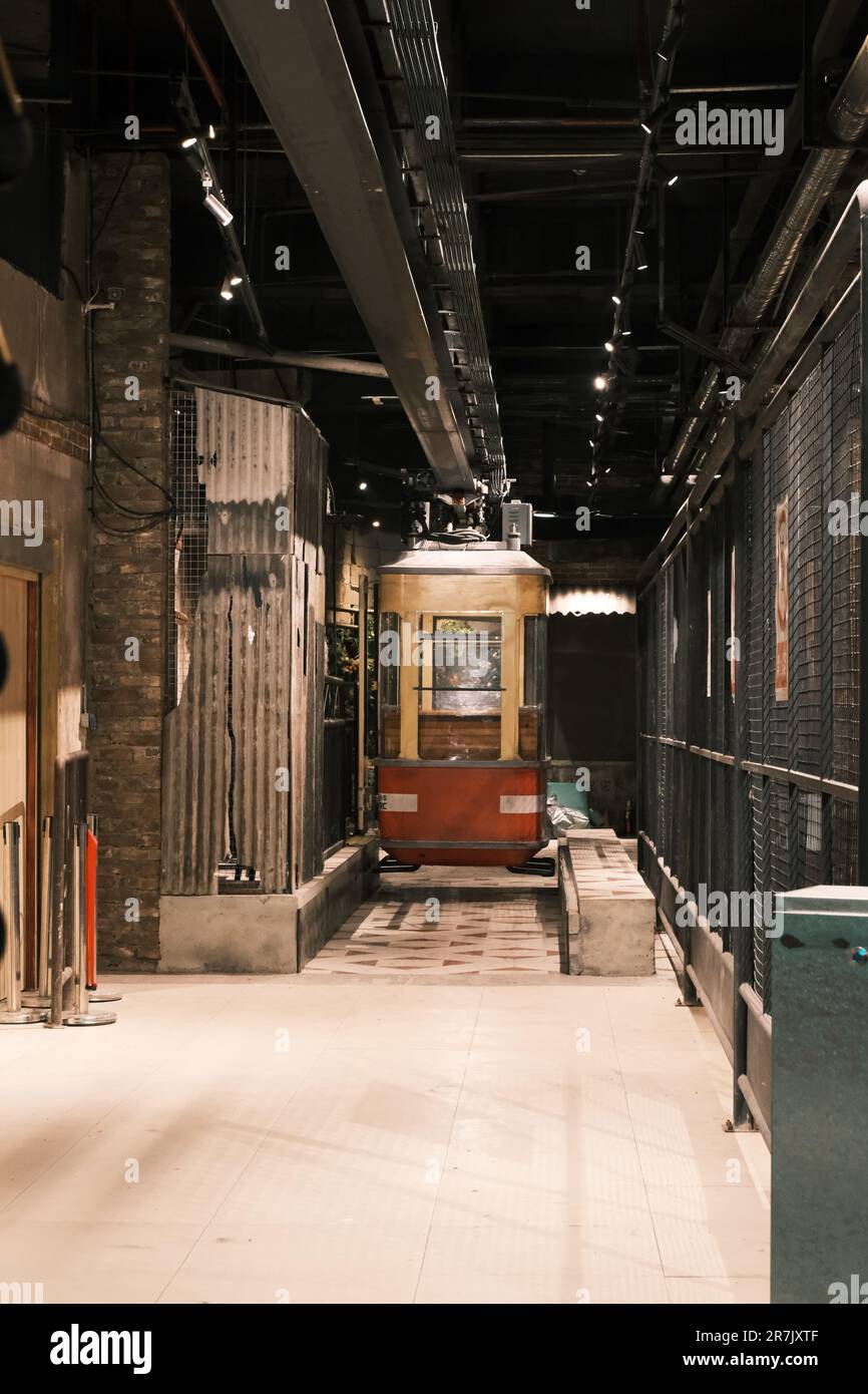 A vintage train in the museum surrounded by antique objects Stock Photo ...