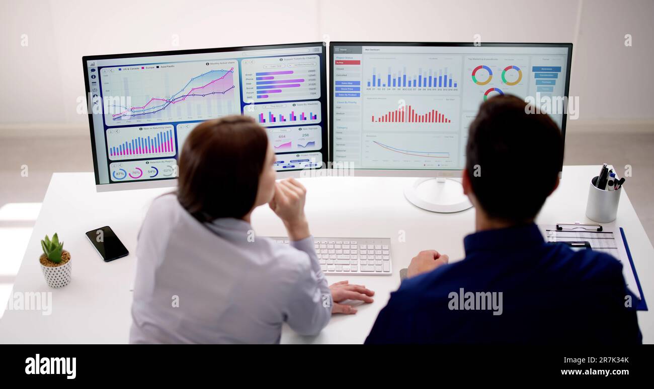 Data Analyst Using Data Analytics KPI Dashboard Stock Photo